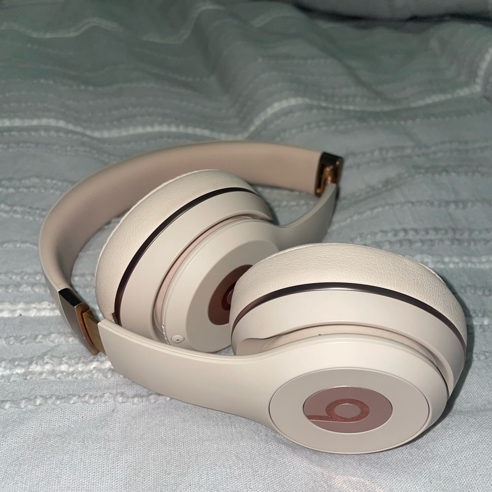 Light pink rose gold beat headphones